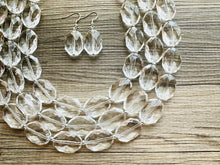 Load image into Gallery viewer, Faceted Resin Beaded Statement Necklace, 3 strand Oval Bead Everyday neutral jewelry, silver accents chunky bib necklace, bridesmaid wedding