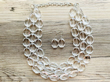 Load image into Gallery viewer, Faceted Resin Beaded Statement Necklace, 3 strand Oval Bead Everyday neutral jewelry, silver accents chunky bib necklace, bridesmaid wedding