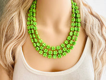 Load image into Gallery viewer, Saint Patricks Green Chunky Statement Necklace & Stretch Bracelet set 3 Strand Beaded Kelly green jewelry bridesmaid earrings gold st pattys