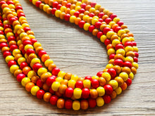 Load image into Gallery viewer, Cobblestone Harvest Chunky Rainbow Beaded Necklace, 5 Strand Colorful Jewelry statement necklace, wood big beaded necklace yellow red orange