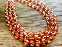 Load image into Gallery viewer, Translucent Coral 3 strand statement Necklace, Peach Beaded Necklace, summer silver jewelry, bubble bib neutral layer coral pink