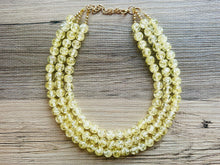 Load image into Gallery viewer, Speckled Pale Yellow Statement jewelry set, Chunky Beaded Necklace, yellow Jewelry, bright colorful Necklace yellow beaded earrings gold