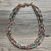 Load image into Gallery viewer, Cosmic Rainbow 5 Strand statement necklace, colorful beaded chunky jewelry, gold metallic jewelry necklace pearl cream white bead ombre