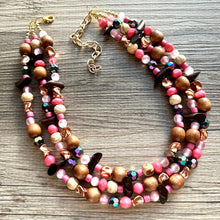 Load image into Gallery viewer, Cabin in the Woods Necklace, Coral Gold statement wood, chunky bib beaded jewelry 3 strand neutral, wooden traveler brown thick bib pink