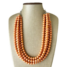 Load image into Gallery viewer, Chunky Multi 5 Strand Statement Necklace, orange peel beaded jewelry, shiny orange jewelry, chunky bib metallic ball beads