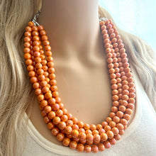 Load image into Gallery viewer, Chunky Multi 5 Strand Statement Necklace, orange peel beaded jewelry, shiny orange jewelry, chunky bib metallic ball beads