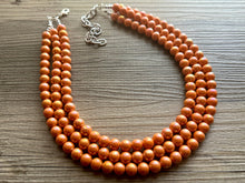 Load image into Gallery viewer, Chunky Multi 3 Strand Statement Necklace, orange peel beaded jewelry, shiny orange jewelry, chunky bib metallic ball beads