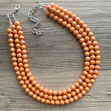 Load image into Gallery viewer, Chunky Multi 3 Strand Statement Necklace, orange peel beaded jewelry, shiny orange jewelry, chunky bib metallic ball beads