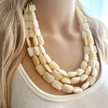 Load image into Gallery viewer, Blonde Beaded Necklace, 3 Strand Statement Jewelry, pale yellow Chunky bib bridesmaid, pastel yellow earrings geometric creamy