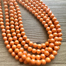 Load image into Gallery viewer, Chunky Multi 5 Strand Statement Necklace, orange peel beaded jewelry, shiny orange jewelry, chunky bib metallic ball beads