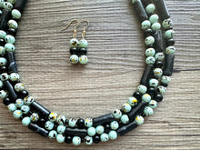 Load image into Gallery viewer, Mint Chocolate Chip Statement Necklace, Green beaded chunky bib jewelry, gold mint dyed necklace, brown green necklace, neutral necklace