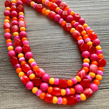 Load image into Gallery viewer, Heat Wave Statement Necklace, neon chunky bib beaded jewelry, Summer pink yellow orange necklace, beaded acrylic jewelry hot pink