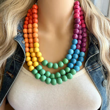 Load image into Gallery viewer, Rainbow Wood Bubble Statement, wooden jewelry, silver chain thick bib chunky necklace, 3 strand red orange yellow green blue purple pink