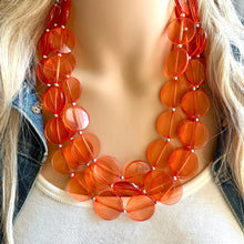 Load image into Gallery viewer, Orange Translucent Chunky Statement Necklace, Big beaded jewelry, triple Strand thick jewelry, red-orange bridesmaid wedding resin beads