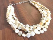 Load image into Gallery viewer, Cream Statement Necklace, Extra chunky multi-strand jewelry, Geometric Beaded Jewelry, off white bib necklace, shell necklace