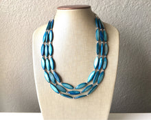 Load image into Gallery viewer, Chunky Multi Strand Strand Blue Shell Statement Necklace, turquoise oval beaded jewelry, shell necklace, blue jewelry, turquoise necklace