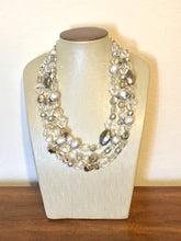 Load image into Gallery viewer, Silver and Clear statement necklace, lucite necklace, resin necklace, clear three strand chunky jewelry, silver Beaded Holiday Necklace