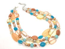 Load image into Gallery viewer, Peach Teal Coral Chunky Statement Necklace, Triple Strand Beaded Jewelry, blue peach coral jewelry, bridsmaid wedding, bib beaded jewelry