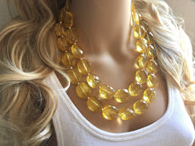 Load image into Gallery viewer, Pale Yellow Statement Necklace, Oval Beaded Everyday yellow jewelry, silver accents chunky bib necklace, clear resin lucite earrings yellow