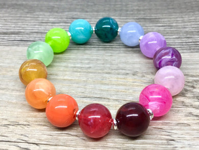 Colorful stretch rainbow bracelet, beaded silver jewelry, rainbow stretchy bracelet, rainbow friendship arm stacking wrapped pride
