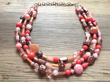 Load image into Gallery viewer, Coral Peach Pink Metallic Purple Triple Strand statement necklace, big beaded chunky jewelry, Coral Orange Bib Jewelry Set, earring jewelry