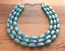 Load image into Gallery viewer, Glacier blue triple strand chunky jewelry, beaded blue jewelry, dark blue thick necklace, teal turquoise necklace, blue bib necklace