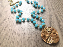 Load image into Gallery viewer, Gold Pendant Necklace on Light blue glass beaded chain, Long acrylic teardrop jewelry, baby blue necklace, gold jewelry colorful
