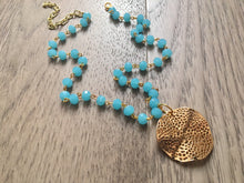 Load image into Gallery viewer, Gold Pendant Necklace on Light blue glass beaded chain, Long acrylic teardrop jewelry, baby blue necklace, gold jewelry colorful