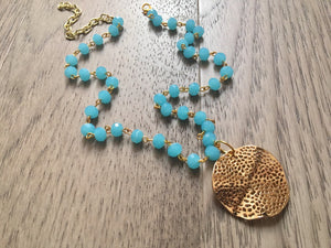 Gold Pendant Necklace on Light blue glass beaded chain, Long acrylic teardrop jewelry, baby blue necklace, gold jewelry colorful