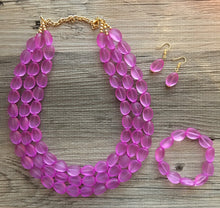 Load image into Gallery viewer, Orchid Chunky Statement Necklace &amp; Stretch Bracelet set, Triple Strand Beaded Jewelry, purple pink jewelry, bridesmaid gold jelly bean