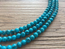 Load image into Gallery viewer, Teal Blue + Black 3 strand Beaded Statement Necklace, Chunky Bib white and Teal Multi-Strand Jewelry Light blue swirl beads ocean side