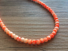 Load image into Gallery viewer, Neon Orange + White strand Beaded Statement Necklace, Chunky Bib white and orange Single Strand Jewelry tie dye swirl earrings bracelet