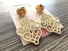 Load image into Gallery viewer, Gold Love Knot + Cream filigree Drop earrings, oval earrings, gold geometric earrings pierced dangle drop Statement, off white metal