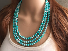 Load image into Gallery viewer, Turquoise Blue 3 strand Beaded Statement Necklace, Chunky Bib white and Teal Multi-Strand Jewelry Light blue swirl beads ocean side