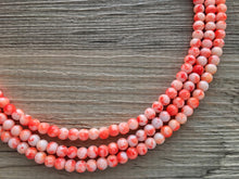 Load image into Gallery viewer, Neon Orange TIE DYE 3 strand Beaded Statement Necklace, Chunky Bib white and Orange Multi-Strand Jewelry Light swirl, neon jewelry