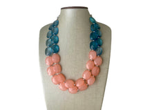 Load image into Gallery viewer, Coral &amp; Navy statement necklace, chunky pink necklace earrings, pink bib necklace, coral jewelry, beaded pink necklace, dark blue jewelry