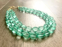 Load image into Gallery viewer, Mint Green Chunky Statement Necklace &amp; Stretch Bracelet set, Triple Strand Beaded Jewelry, Green jewelry, bridesmaid gold jelly bean