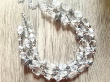 Load image into Gallery viewer, Silver and Clear statement necklace, lucite necklace, resin necklace, clear three strand chunky jewelry, silver Beaded Holiday Necklace
