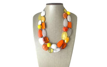 Load image into Gallery viewer, Candy Corn Statement Necklace, chunky bib beaded jewelry, Halloween jewelry white yellow orange necklace, beaded acrylic jewelry