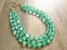 Load image into Gallery viewer, Mint Green Chunky Statement Necklace &amp; Stretch Bracelet set, Triple Strand Beaded Jewelry, Green jewelry, bridesmaid gold jelly bean