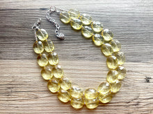 Load image into Gallery viewer, Pale Yellow Statement Necklace, Oval Beaded Everyday yellow jewelry, silver accents chunky bib necklace, clear resin lucite earrings yellow