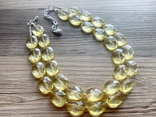 Load image into Gallery viewer, Pale Yellow Statement Necklace, Oval Beaded Everyday yellow jewelry, silver accents chunky bib necklace, clear resin lucite earrings yellow