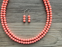 Load image into Gallery viewer, Two Strand Coral Statement Necklace, pink - orange beaded jewelry, peach necklace, coral jewelry, peach bridesmaid, coral earrings bead