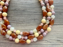 Load image into Gallery viewer, Butterscotch Sundae Statement Necklace, Chunky 3 Strand Jewelry, brown necklace pink yellow necklace, gold bib beaded necklace neutral