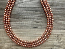 Load image into Gallery viewer, Rosegold Lava Rock Chunky Statement Necklace, 3 Strand Beaded Jewelry pink copper gold jewelry, bridesmaid wedding bib rose gold