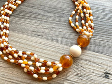 Load image into Gallery viewer, Orange &amp; Cream Statement Necklace, 6 strand chunky long necklace, teal jewelry, warm orange white acrylic vintage beaded necklace