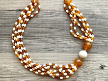 Load image into Gallery viewer, Orange &amp; Cream Statement Necklace, 6 strand chunky long necklace, teal jewelry, warm orange white acrylic vintage beaded necklace