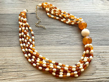 Load image into Gallery viewer, Orange &amp; Cream Statement Necklace, 6 strand chunky long necklace, teal jewelry, warm orange white acrylic vintage beaded necklace