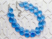 Load image into Gallery viewer, Periwinkle Party Necklace, multi strand jewelry, big beaded chunky statement necklace, blue clear resin chambray, bridesmaid earrings