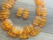 Load image into Gallery viewer, Textured Orange Statement Necklace, Big Beaded necklace, chunky beaded necklace wedding, clementine jewelry, white striped jewelry